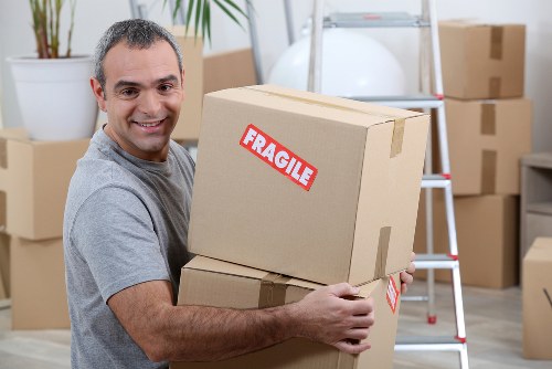 Professional movers handling a flat move near Holloway Road
