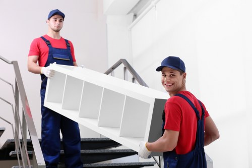 Removal team loading a van for a move in Holloway