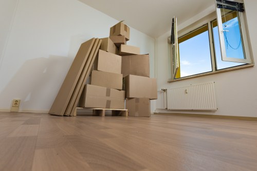 Furniture and boxes being loaded into a removals van