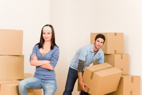 Professional movers handling apartment access in Holloway