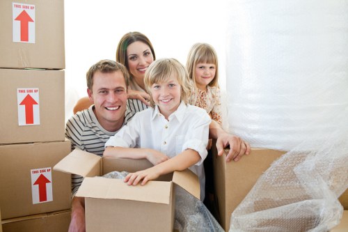 Loading furniture and boxes into a van for a Holloway collection