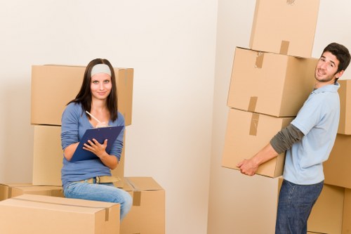 Packed moving boxes and furniture prepared for a Holloway house removal